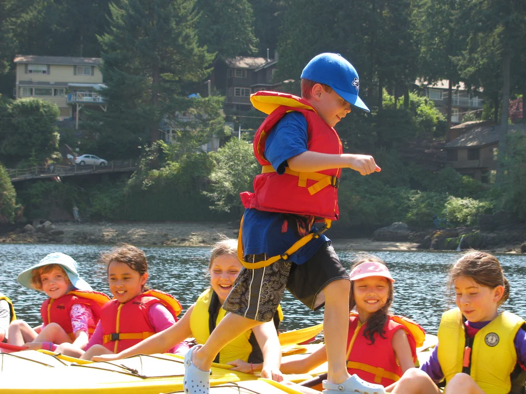 Kids Kayaking at Camp for the best adventure camps for kids list