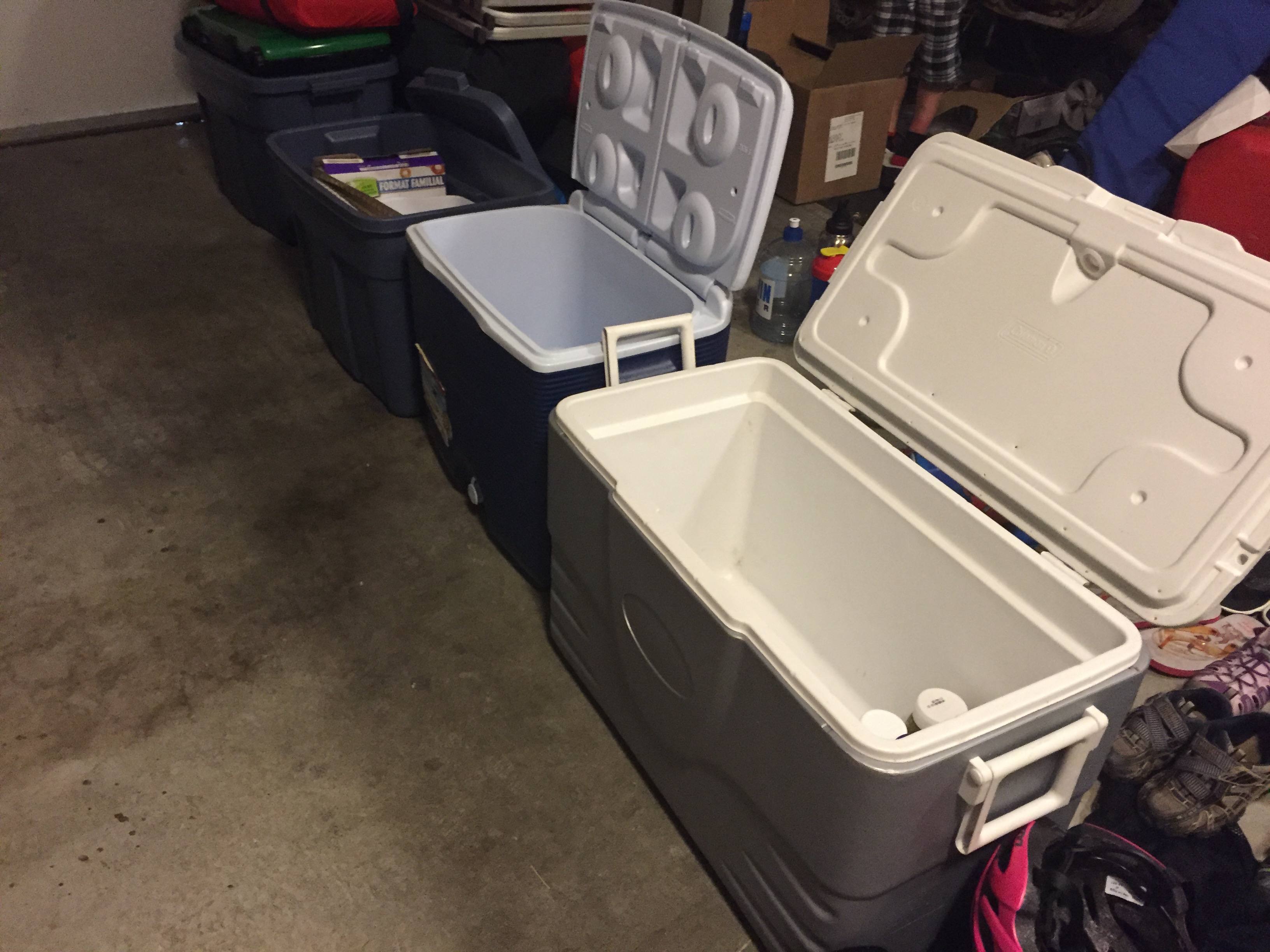 Coolers and bins ready to go for how to pack for a road trip