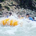 rafting through a rapid