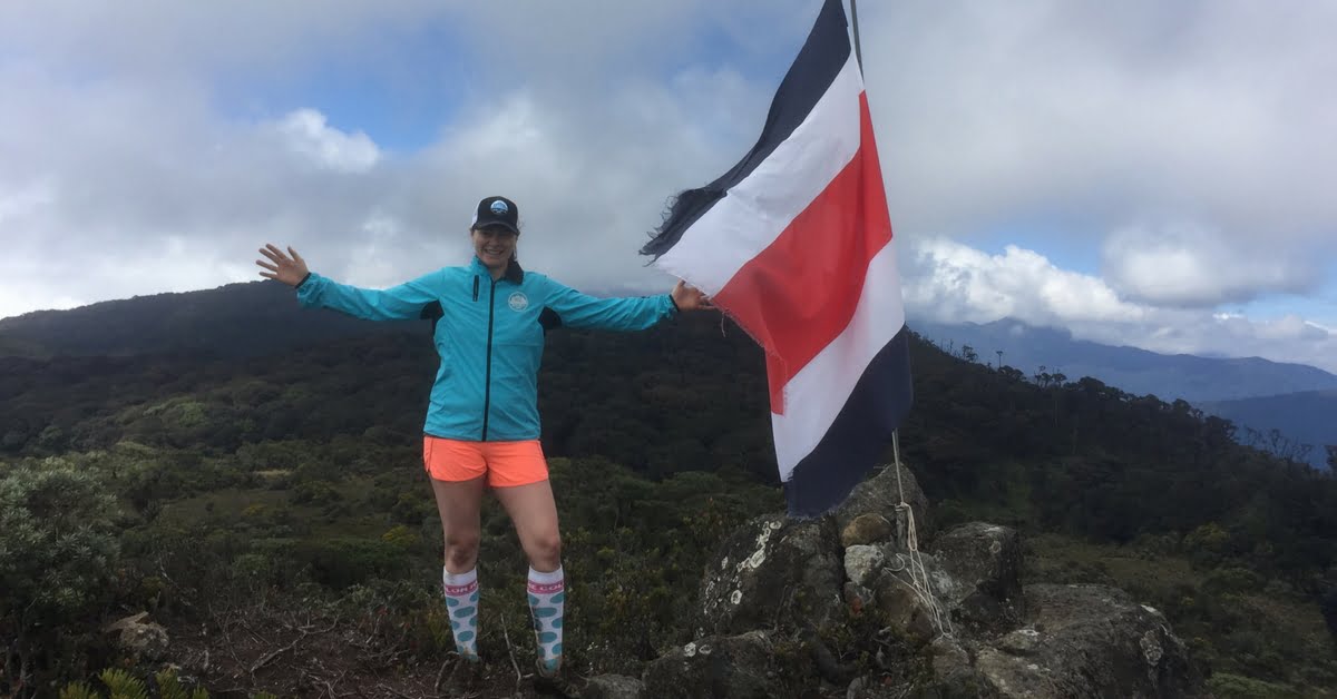 woman at the top of the Ena hike at the run like a girl adventure retreat in costa rica