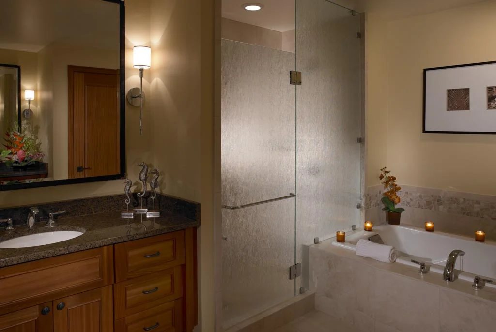 view of the large master bathroom with a walk in shower and large soaker tub