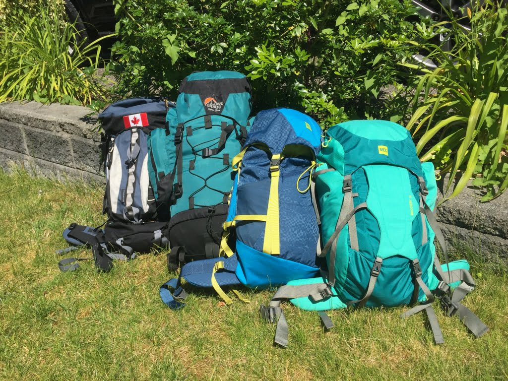 packed-backpacks-in-backyard