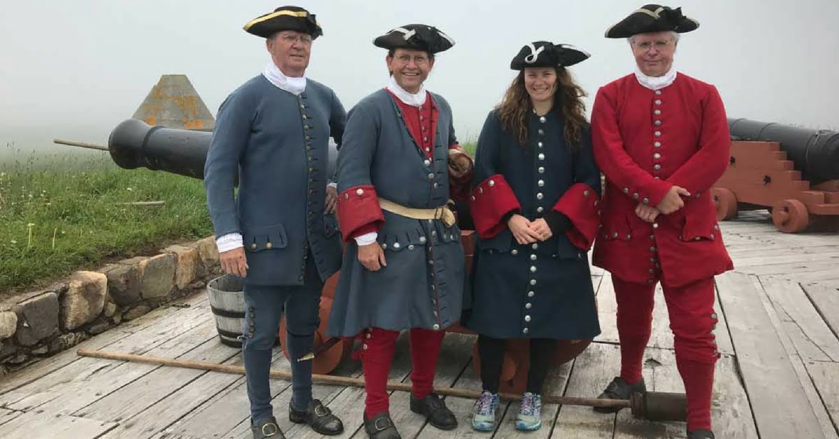 people dressed in period clothing at the fortress of louisbourg national historic site