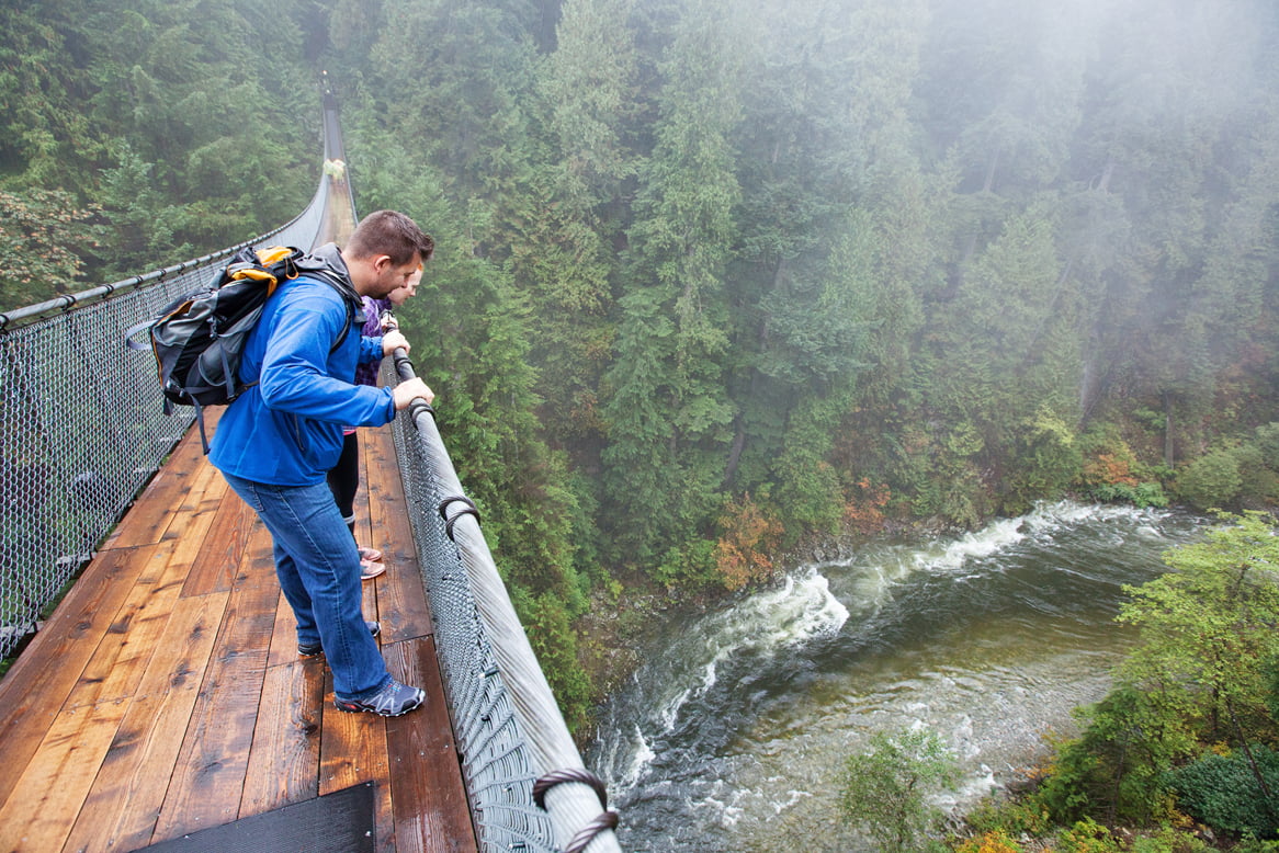People looking over suspension bridge for Vancouver Day trips for families