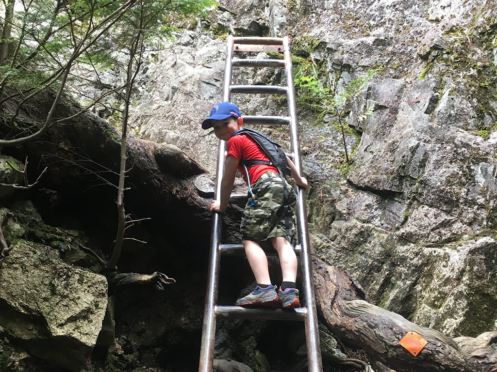 boy-climbing-ladder-on-the-chief-hike
