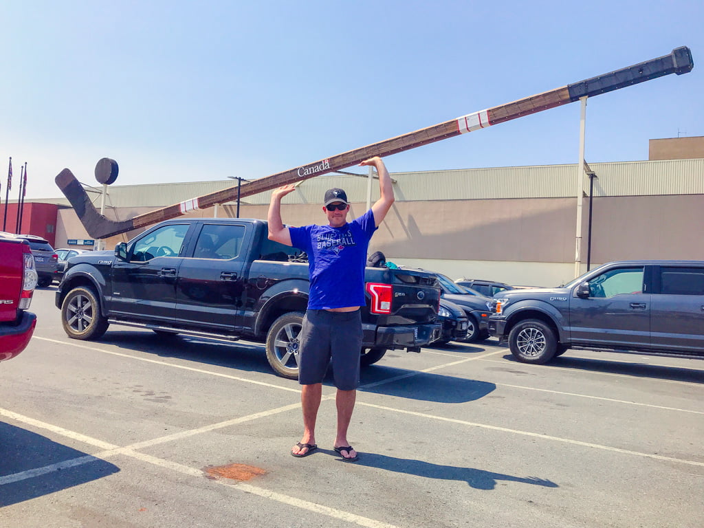 man-holding-giant-hockey-stick-in-cowichan