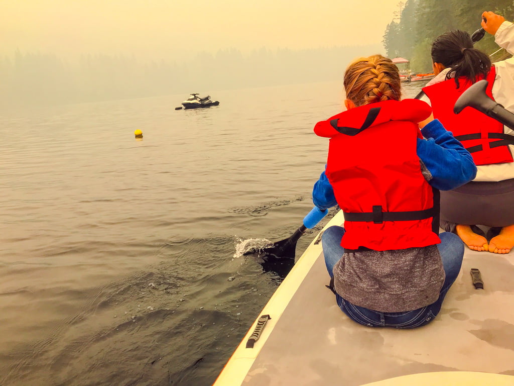 Children on paddle board from Heffley Lake Paddle board rentals
