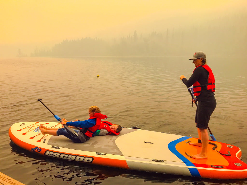 Jami Savage and children on a paddle board from Heffley Lake paddle board rentals
