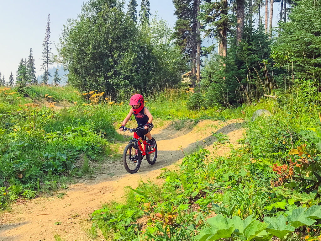 Sun-Peaks-Mountain-Biking-Lessons-boy-on-his-bike-on-trail