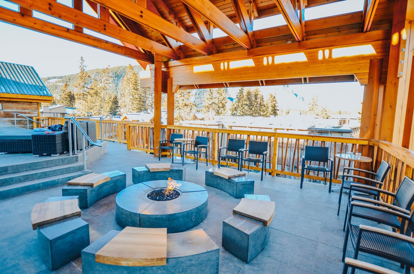 rooftop-fire-and-hot-tub at the moose hotel and suites, best family hotel in Banff