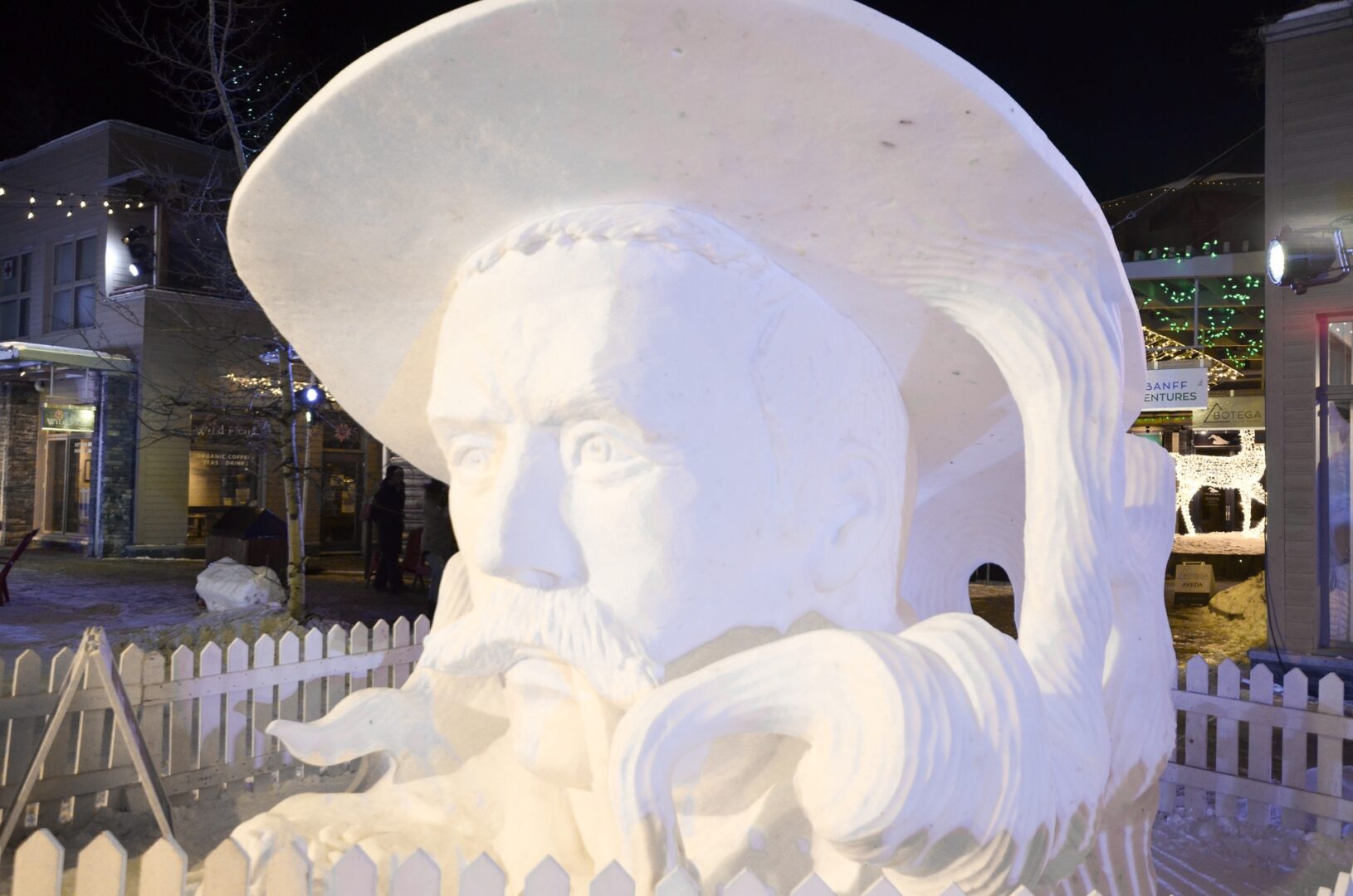 Snow sculpture of a man's head at Banff Snowdays Festival 