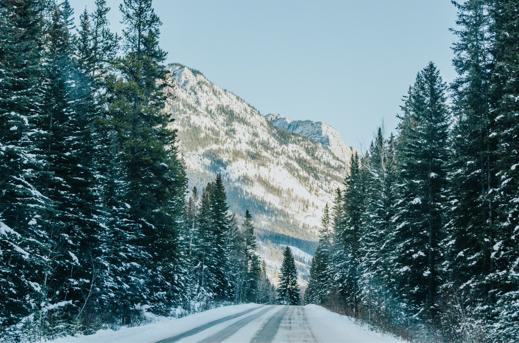 Old snow covered highway seen during Banff photography tours 