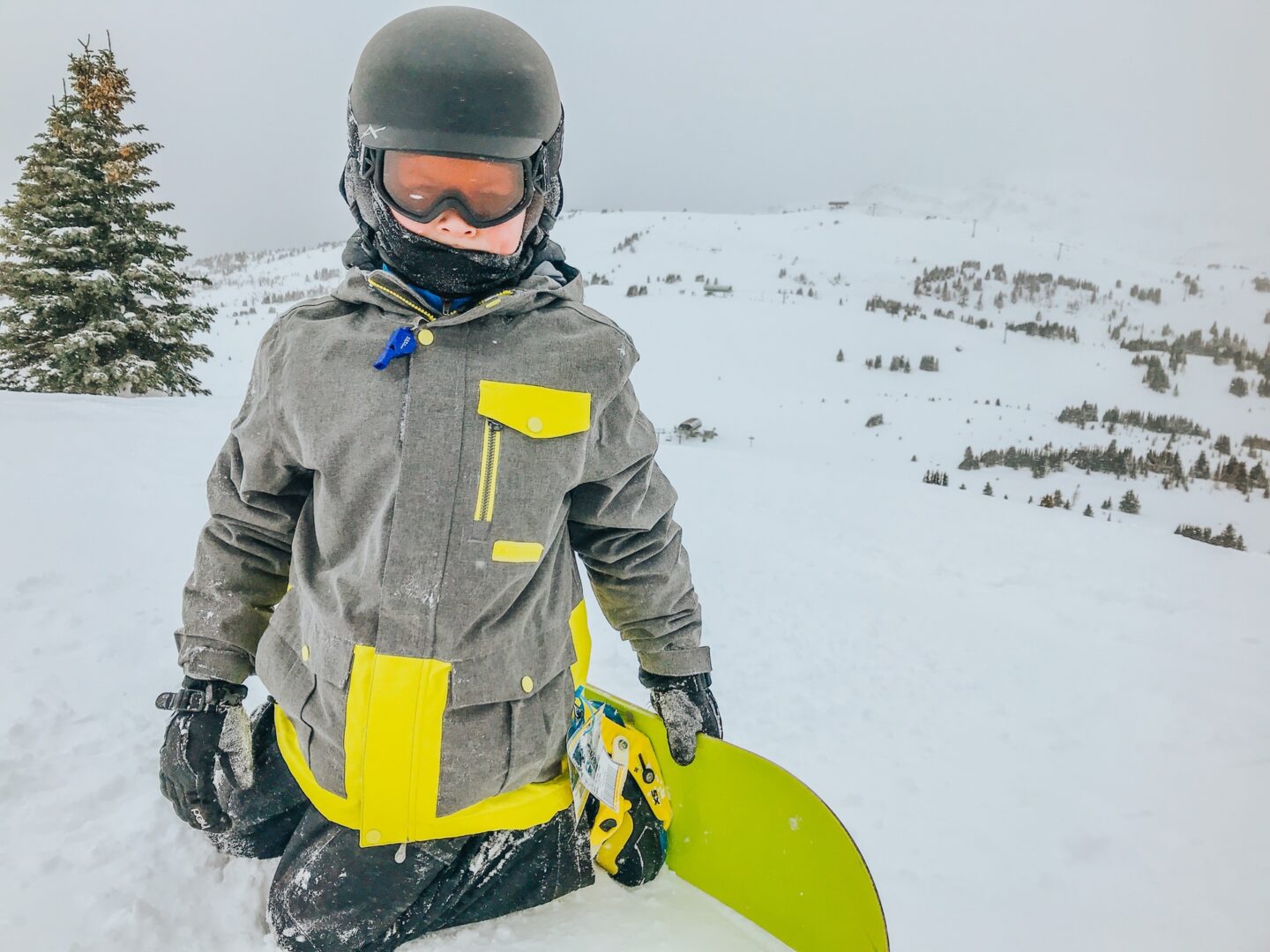 Boy on ski hill at Sunshine Village Ski & Snowboard Resort Banff