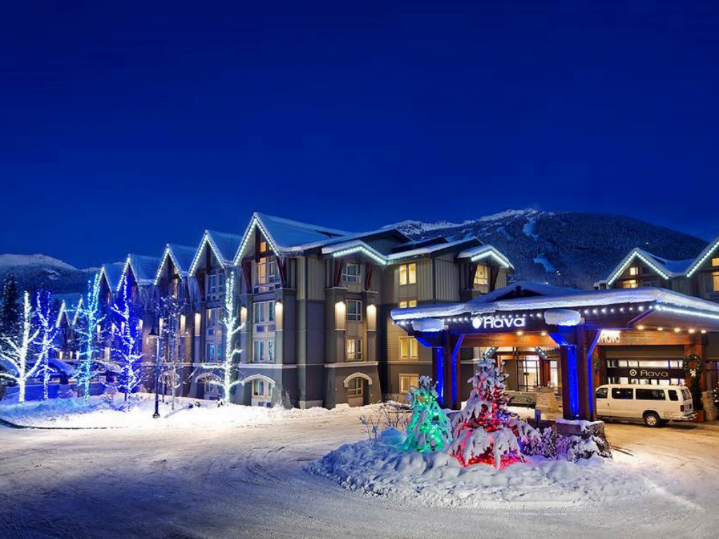Front entrance view of Aava Whistler hotel with Christmas Lights on