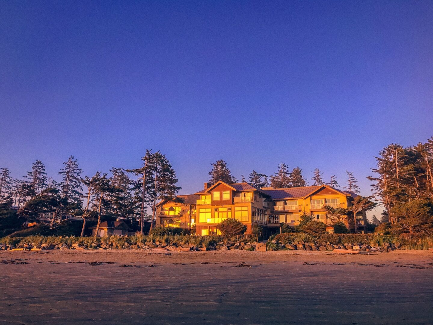 looking-at-long-beach-lodge-resort-at-sunset-from-beach