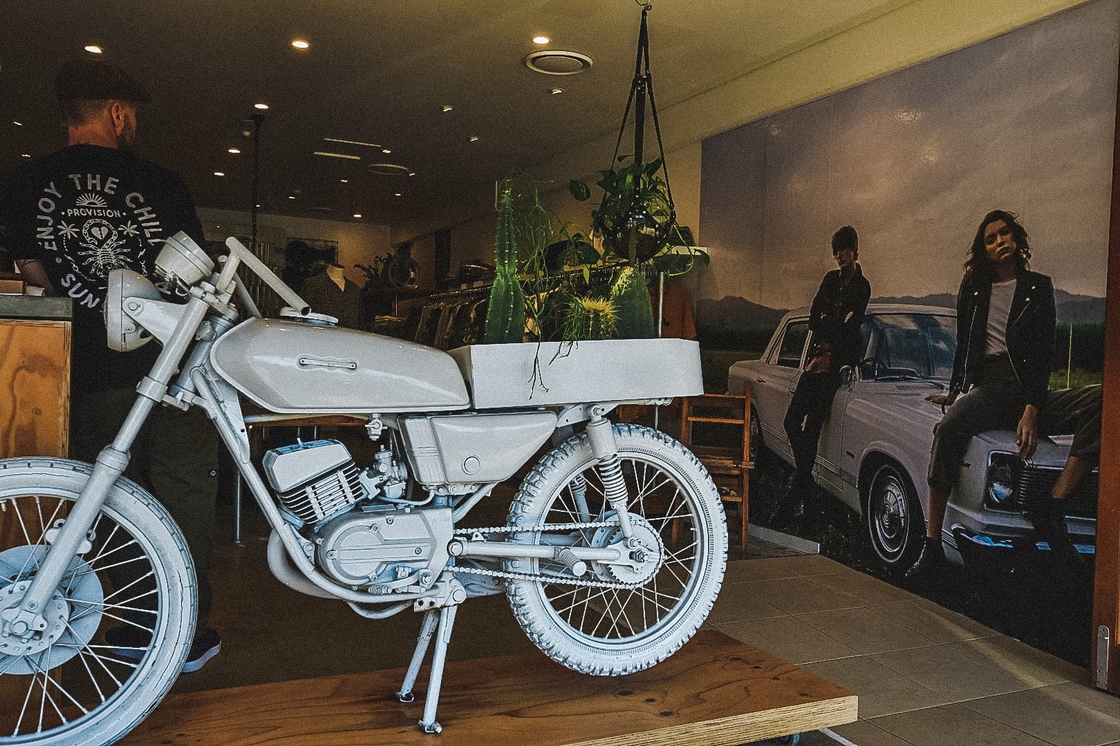 motorcycle display in clothing store in byron bay