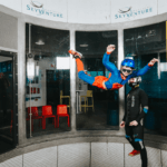 Young girl flying at indoor skydiving Montreal