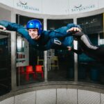Man indoor skydiving