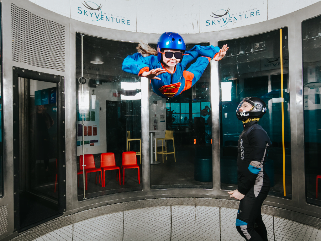 Girl skydiving indoors