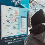 woman looking at activities available on the winterlude guide map
