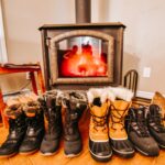Warming snow boots up by the fire at chalets lanaudiere
