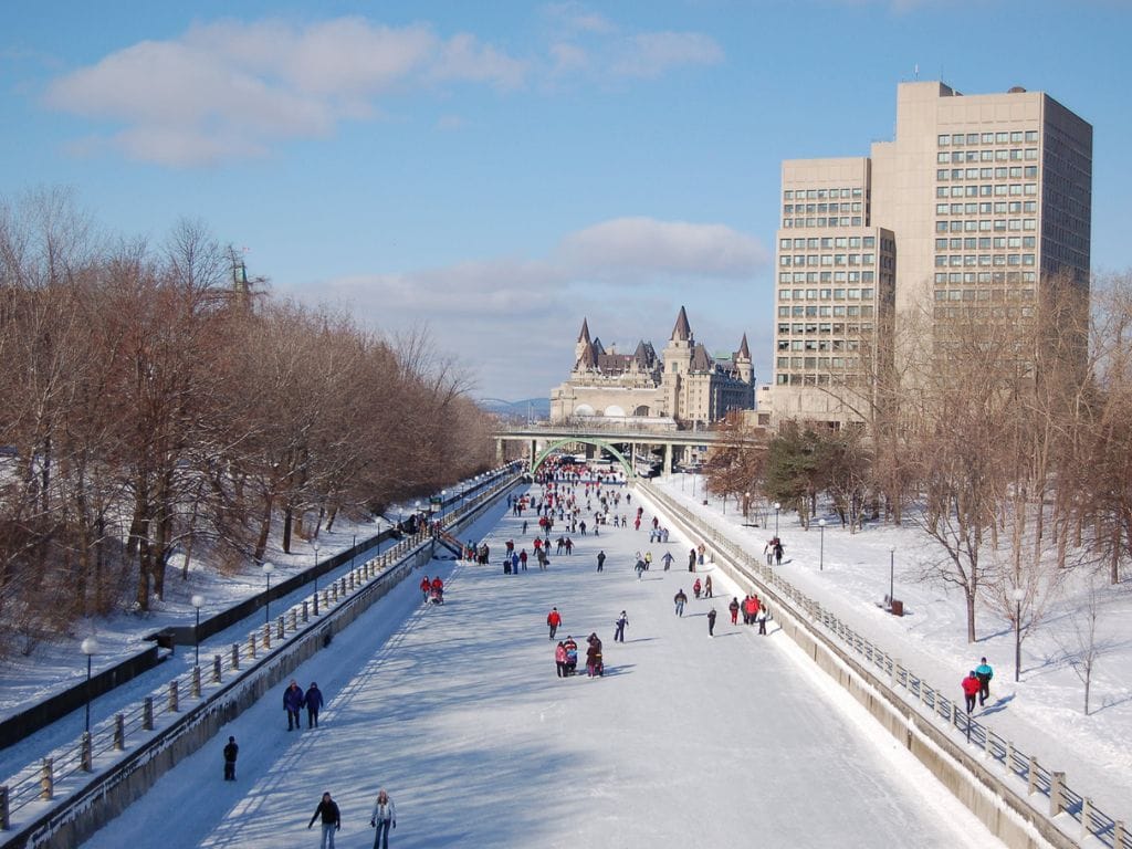 lots of people on a sunny day experiencing rideau canal skating