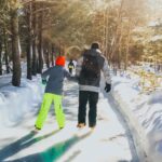 family skating through the forest Quebec