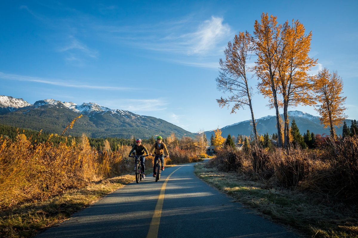 two people biking in whistler, a great fall activities vancouver