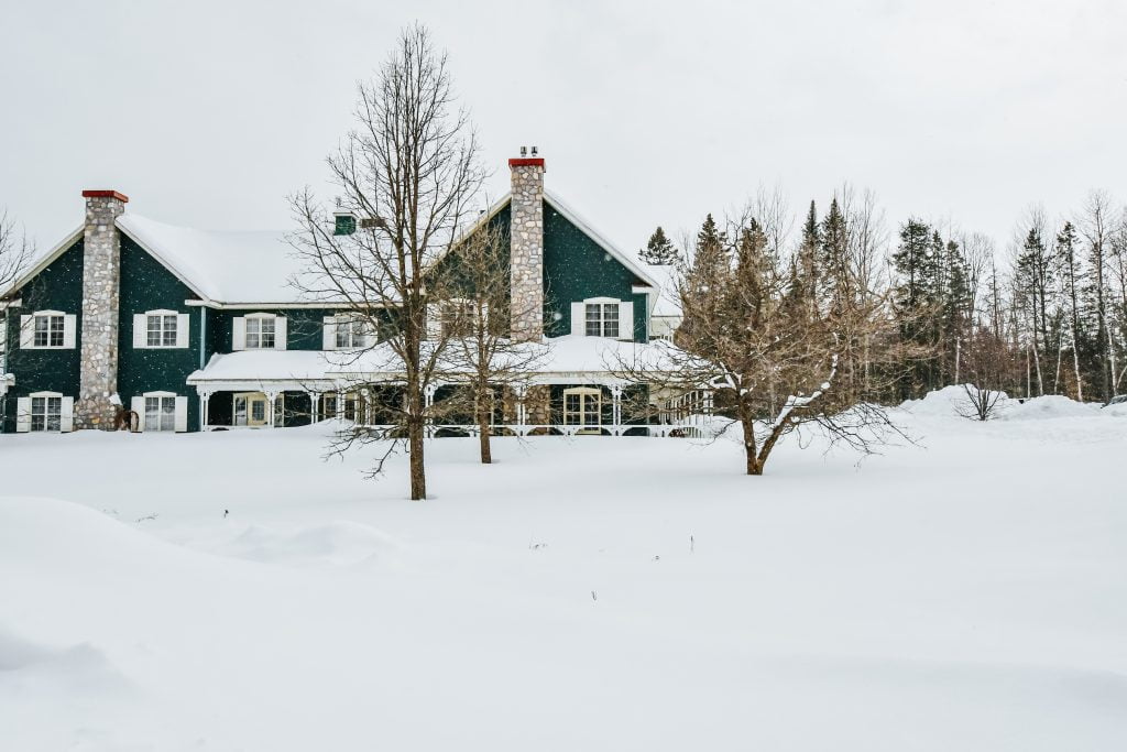 eco-resort covered in snow in quebec