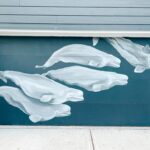 mural of a beluga family