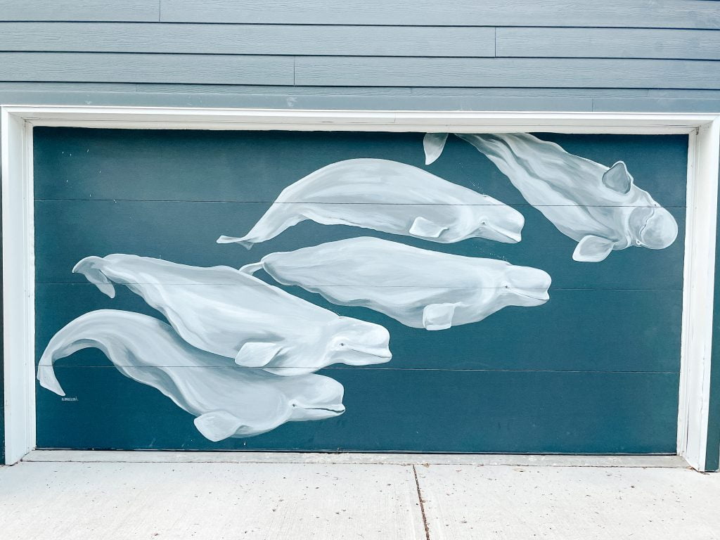mural of a beluga family