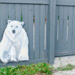 polar bear mural on a fence