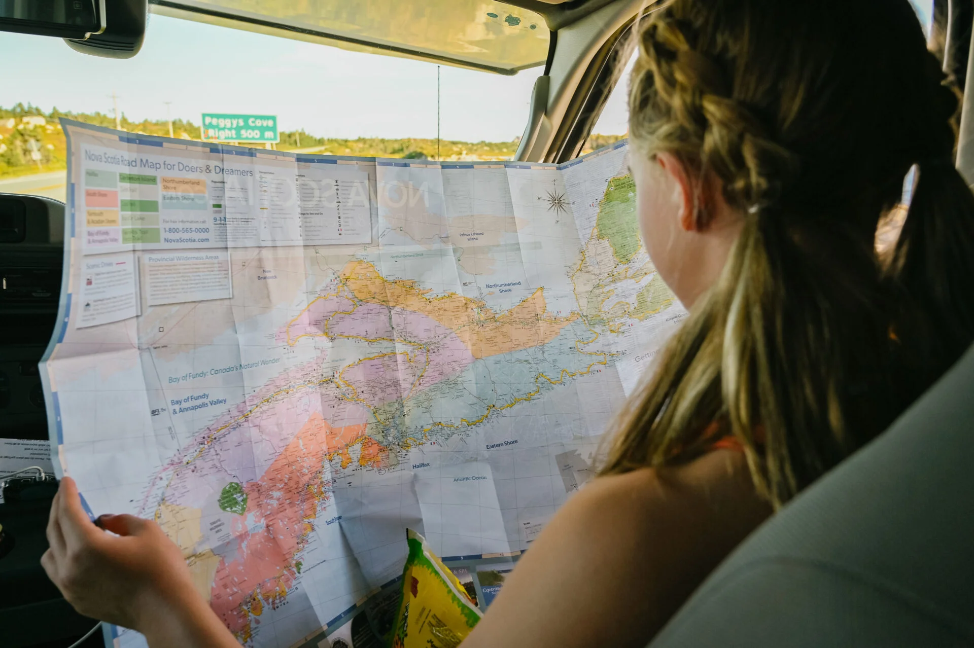 Nova Scotia Road Tripper looking at a map - Halifax road trip