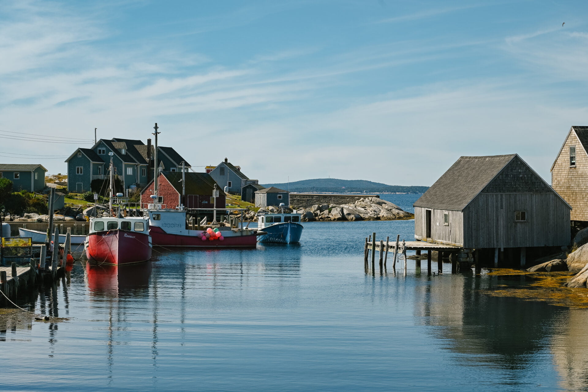 boats in the harbour in peggys cove tour