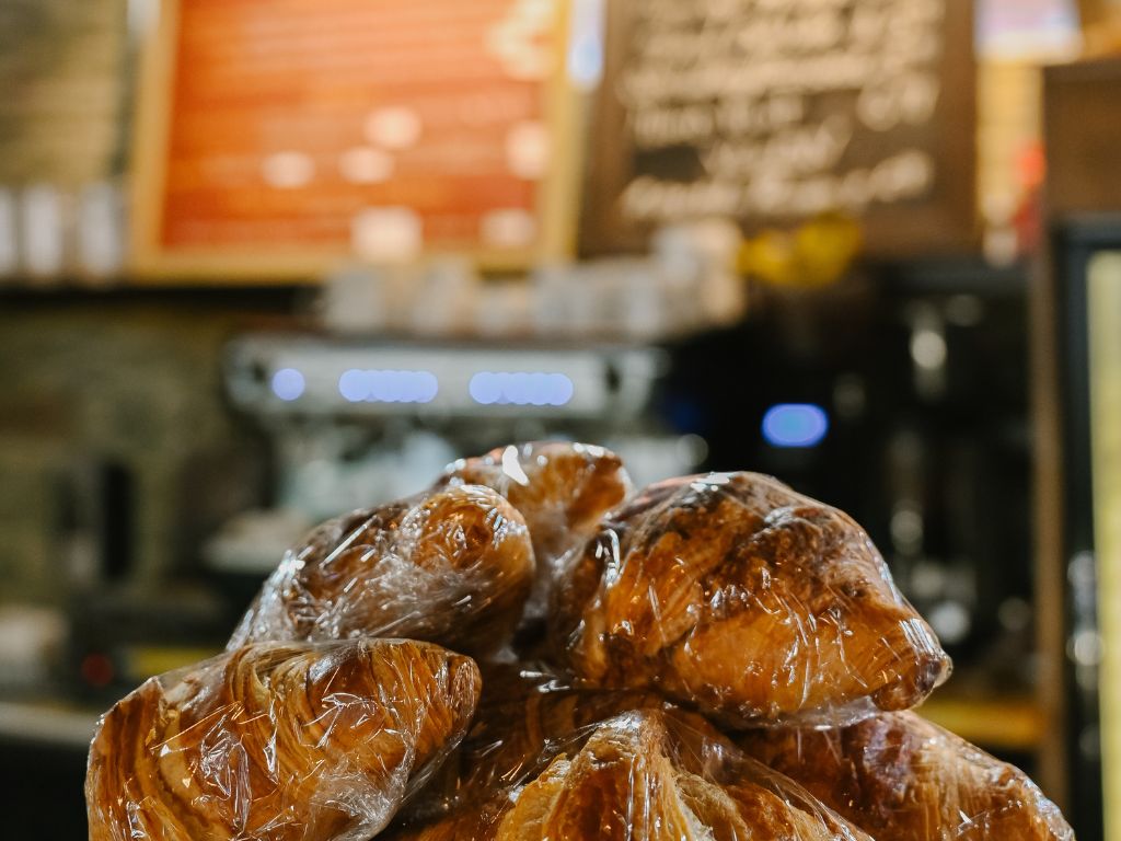 close up of individually wrapped croissants on a display at the bedford basin farmers market cafe and bistro