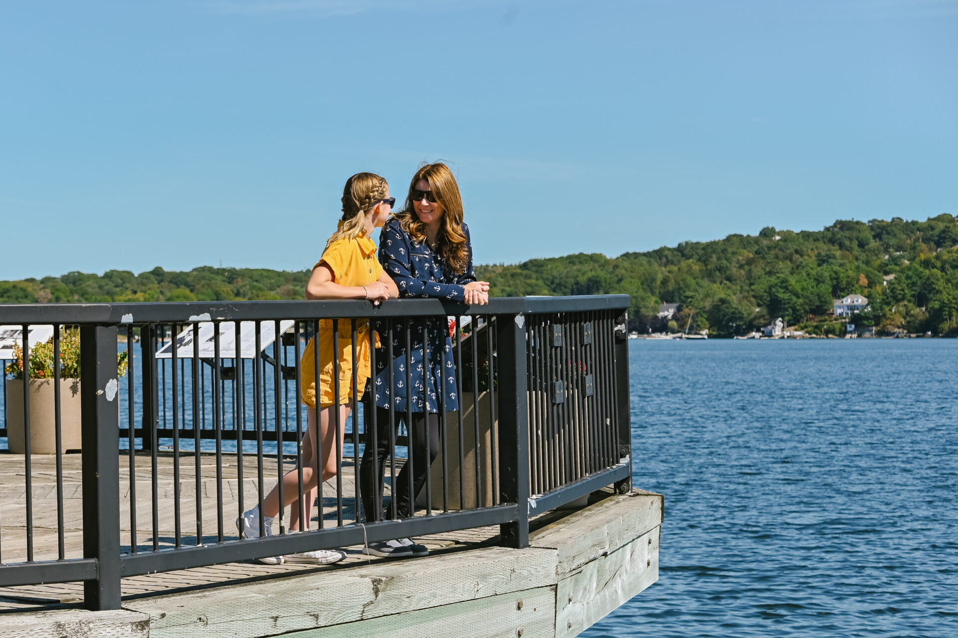 DeWolf Park in Bedford, Nova Scotia, jami and daughter stand on a pier on their Halifax road trip 
