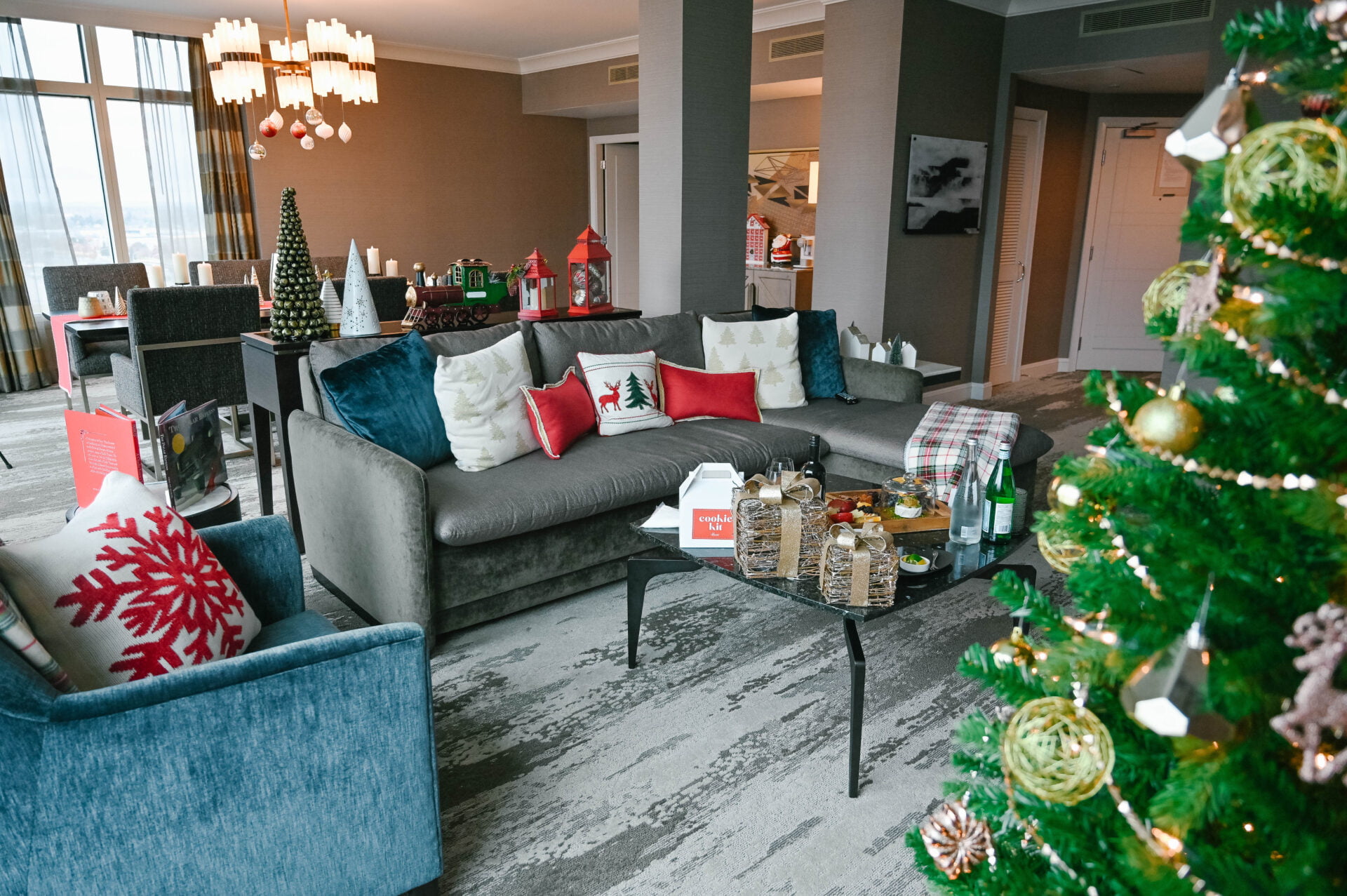 living and dining room spaces inside the fairmont yvr hotel vancouver christmas suite