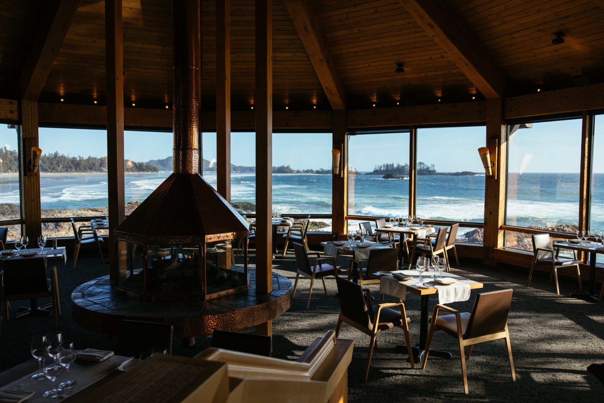inside view of the dining room at the wickanninish inn, the best storm watching hotel in tofino