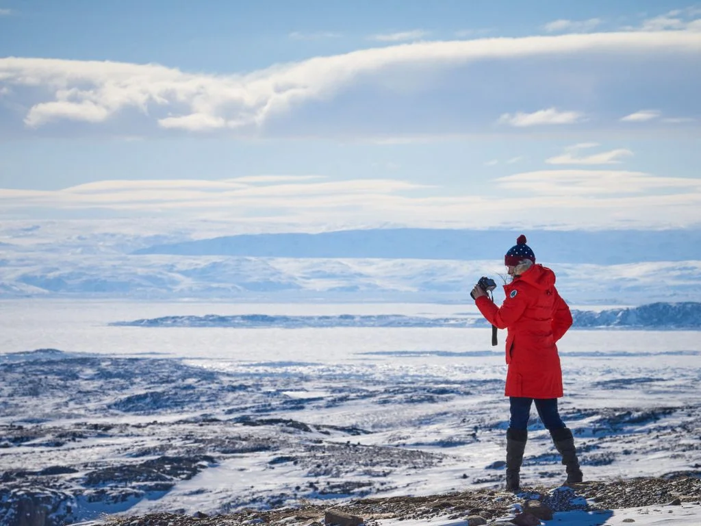 jami standing on the snow covered ground in nunavut