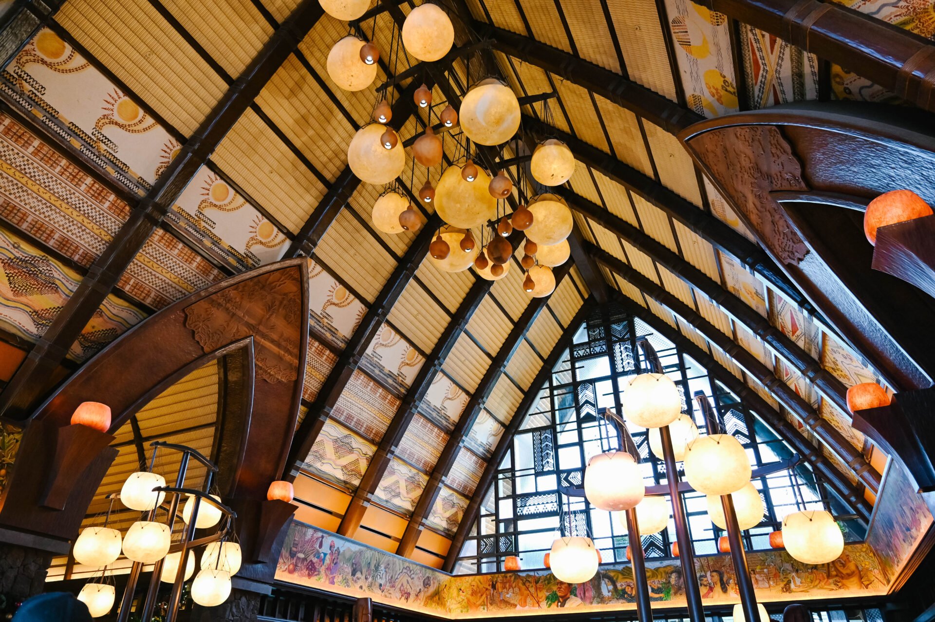 the artistic details on the roof of the lobby at aulani a disney resort and spa