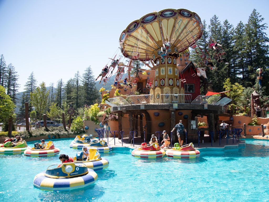 view of the bumper boats and swing ride at cultus lake adventure park, one of the spring break ideas vancouver