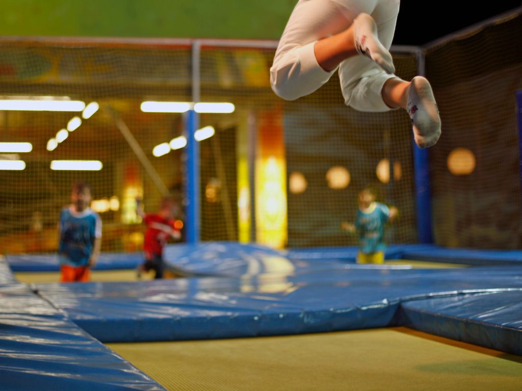 kids jumping on an indoor trampoline