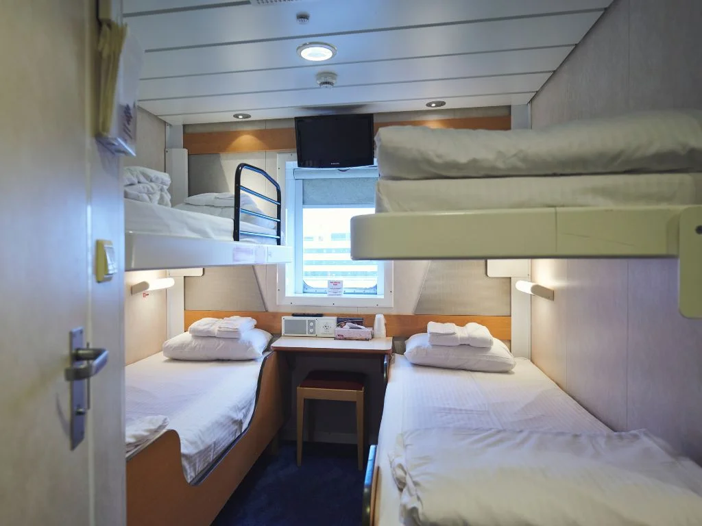 inside view of a ferry cabin that has 4 beds, operated by marine atlantic