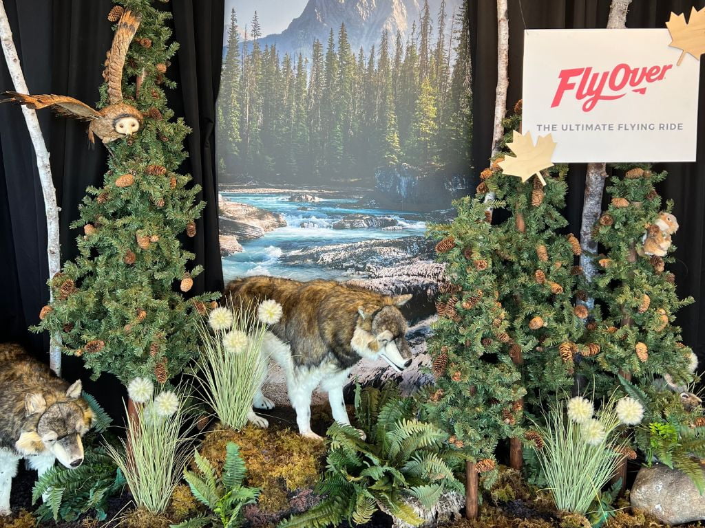 display featuring trees and animals at the entrance of the flyover canada Windborne Call of the Canadian Rockies experience