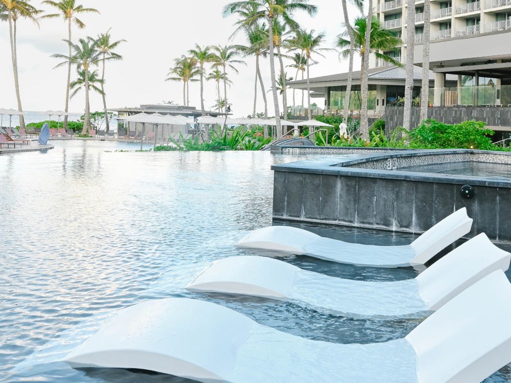 adult infinity pool with loungers at turtle bay blog