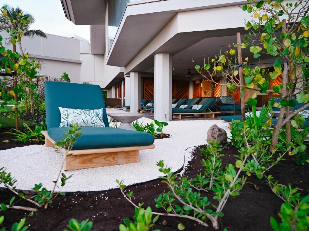 comfortable lounge chairs outside of the spa at turtle bay blog resort