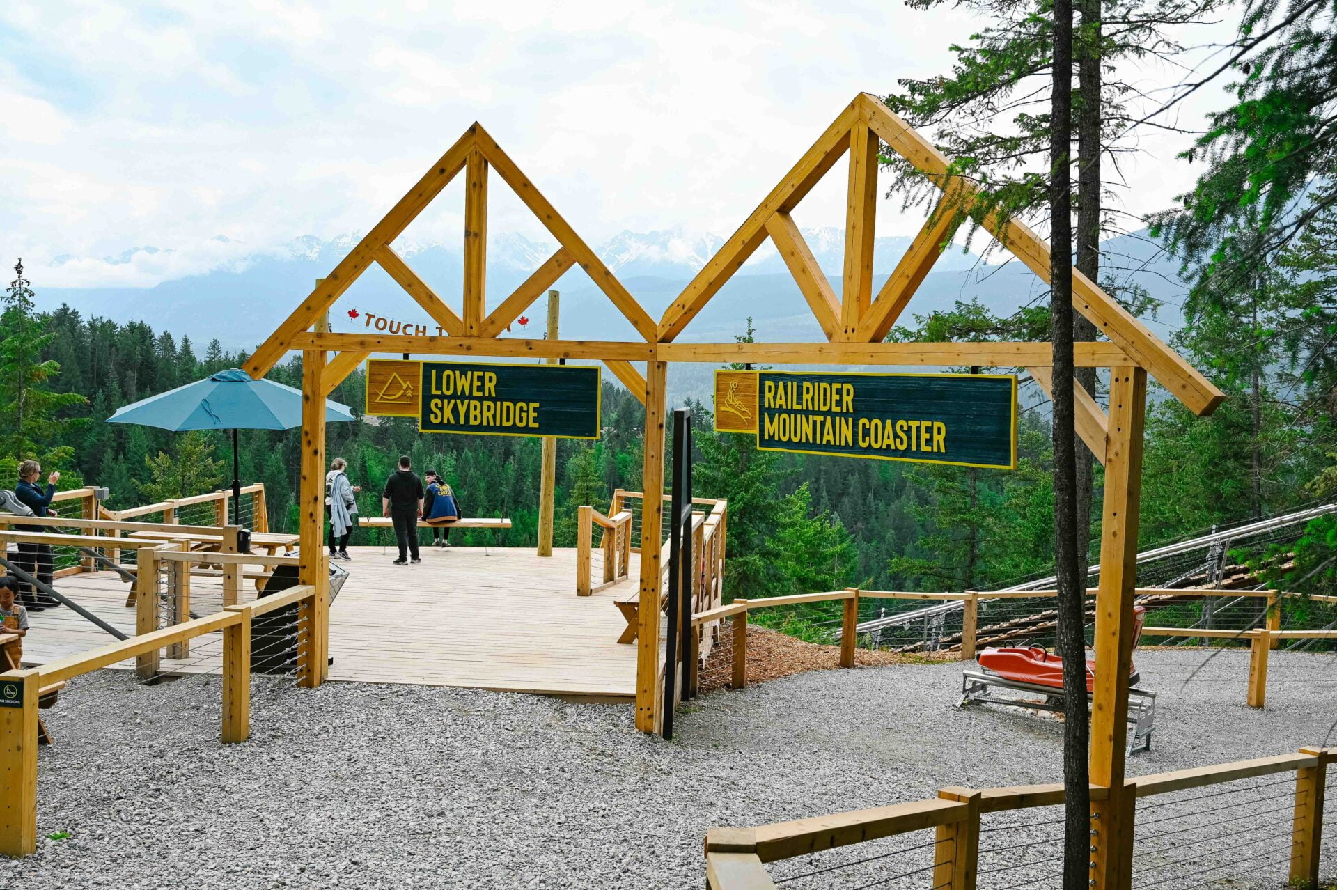 entrances to the lower skybridge and railrider mountain coaster at golden suspension bridge