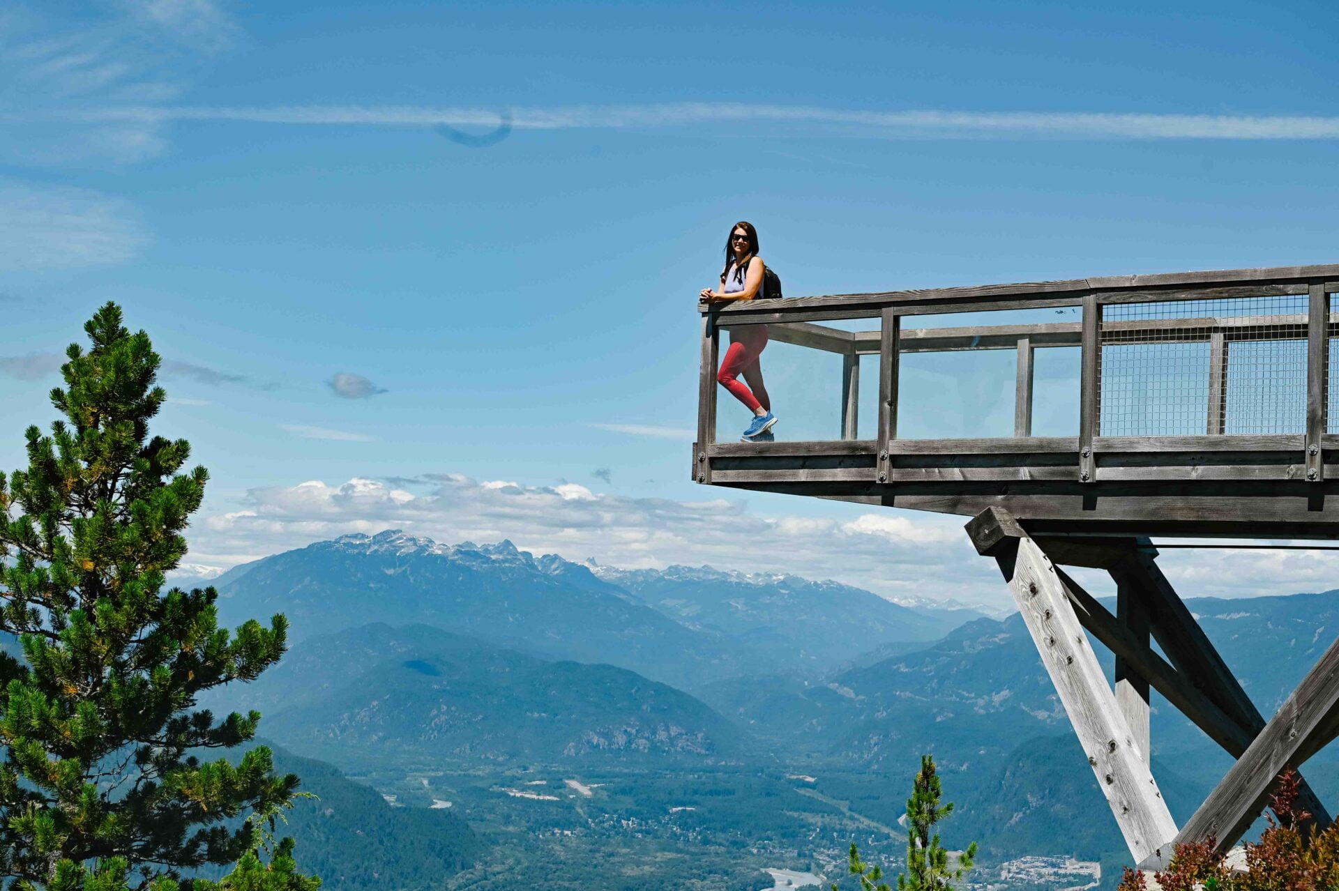 woman standing on lookout platform at the sea to sky gondola