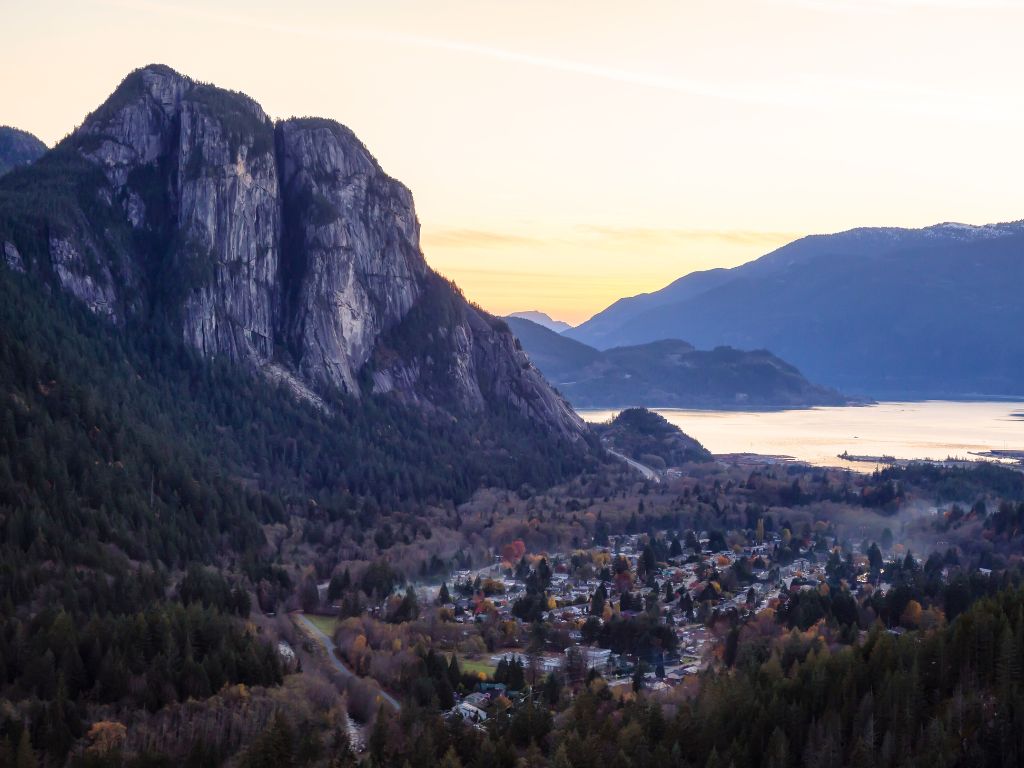 view of the town of squamish with the squamish chief mountain in the background