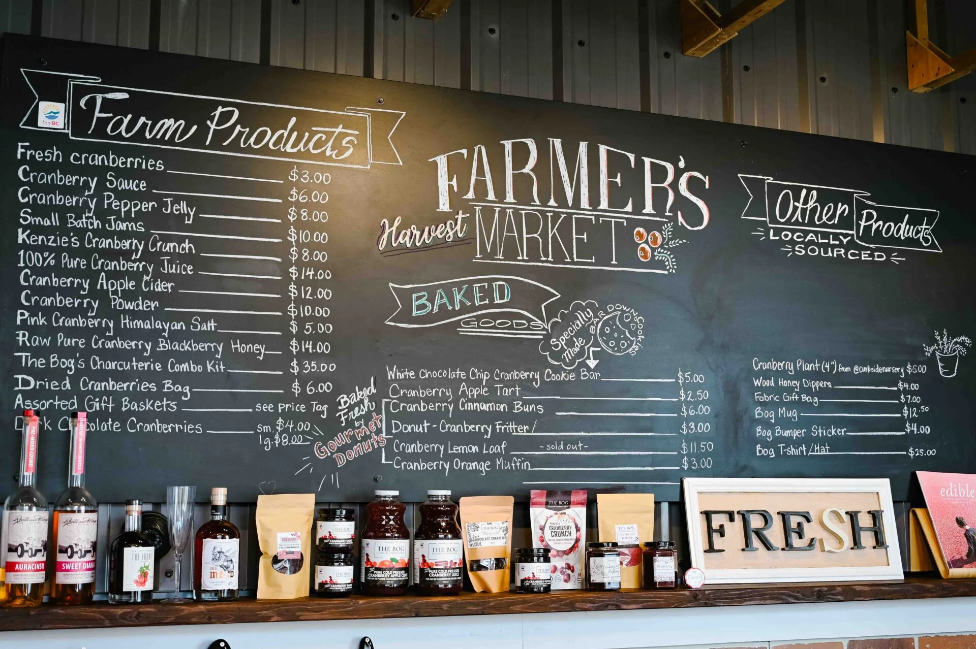 sign at the bog store showing all of the cranberry products they have for sale